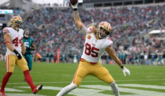 San Francisco 49ers tight end George Kittle (85) celebrates after scoring a touchdown during the second half of an NFL football game against the Jacksonville Jaguars on Sunday in Jacksonville, Florida.