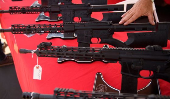 A TPM Arms LLC California-legal featureless AR-15 style rifle is displayed for sale at the company's booth at the Crossroads of the West Gun Show at the Orange County Fairgrounds on June 5, 2021 in Costa Mesa, California.