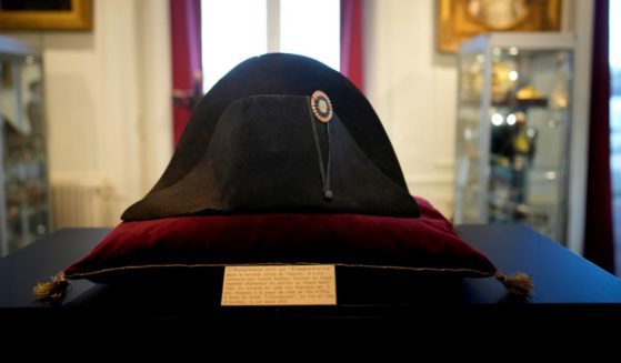 One of the signature broad, black hats that Napoléon wore when he ruled 19th century France and waged war in Europe is on display at Osenat's auction house in Fontainebleau, south of Paris on Friday.