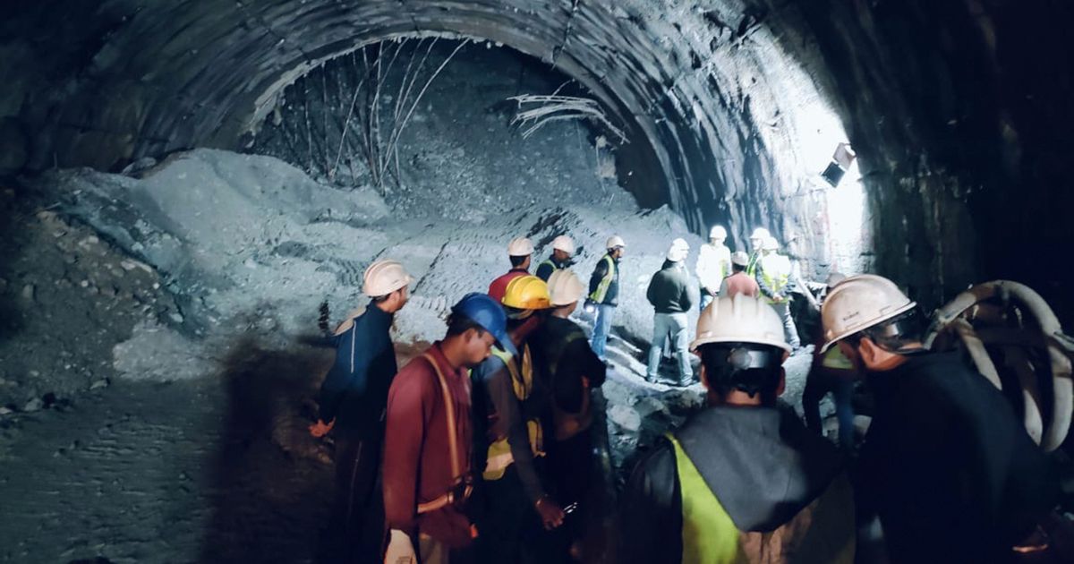 This photo provided by Uttarakhand State Disaster Response Force (SDRF) shows rescuers inside a collapsed road tunnel where more than 30 workers were trapped by a landslide in northern in Uttarakhand state, India on Sunday.