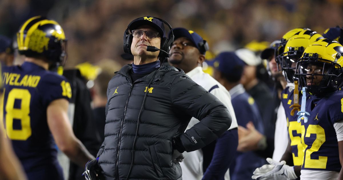 Head coach Jim Harbaugh of the Michigan Wolverines looks on in the first half while playing the Purdue Boilermakers at Michigan Stadium on November 4, 2023 in Ann Arbor, Michigan.