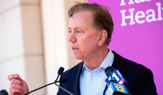 Connecticut Governor Edward Miner "Ned" Lamont Jr. speaks about the states efforts to get more people vaccinated at Hartford HealthCare St. Vincent's Medical Center in Bridgeport, Connecticut on Feb. 26, 2021.