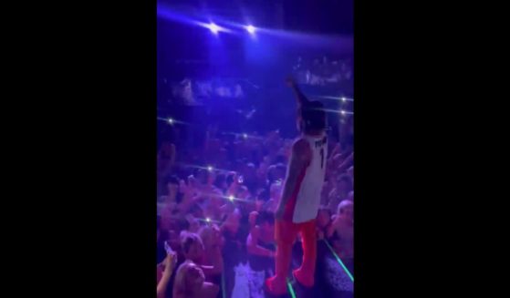This Twitter screen shot shows rapper Lil' Pump leading chants for former President Donald Trump at the University of Arizona in Tucson.