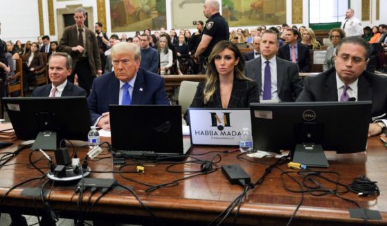Former President Donald Trump sits in the courtroom with attorneys Christopher Kise, left, and Alina Habba during his civil fraud trial at New York State Supreme Court on Monday in New York City.