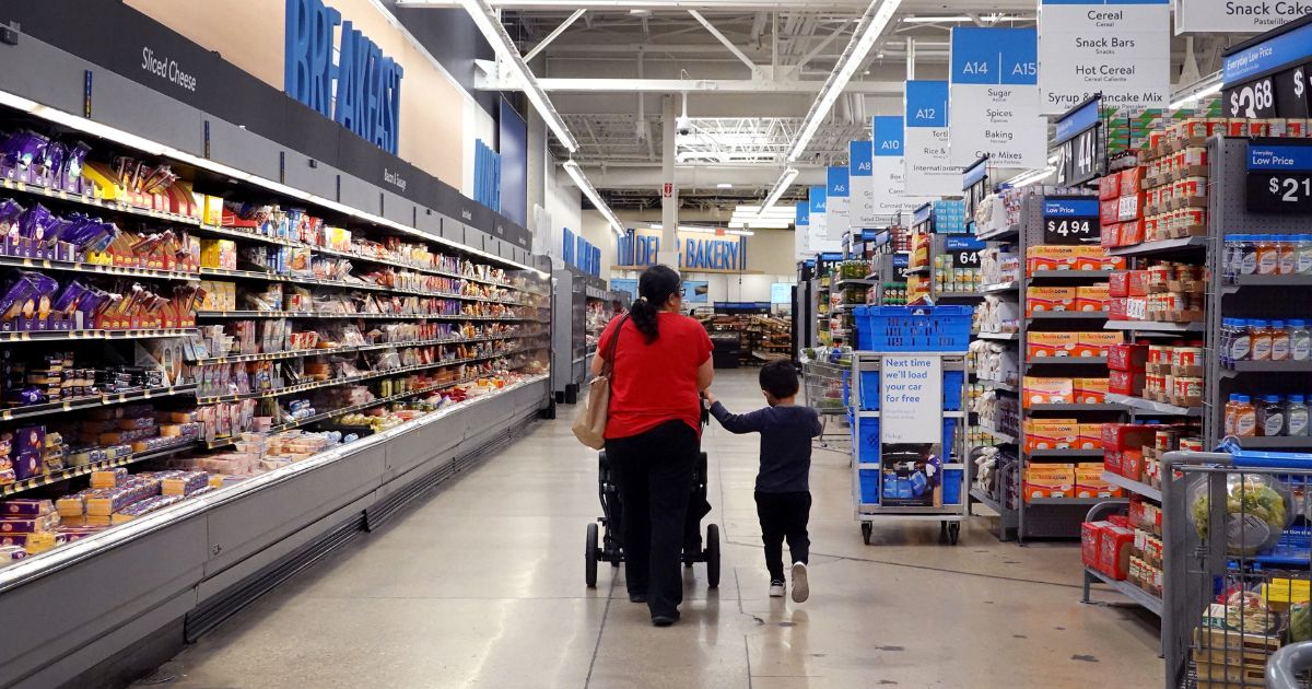 Customers shop at a Walmart store in Chicago, Illinois, on May 18. Walmart announced Tuesday that stores would have "sensory-friendly" hours in all U.S. stores.