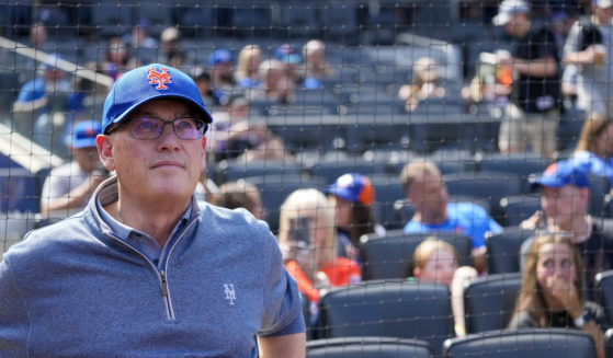 New York Mets owner Steve Cohen is seen at a baseball game between the Mets and the Cincinnati Reds on Sept. 17. Cohen's Mets finished 2023 with a tax payroll of $374.7 million, according to figures finalized by Major League Baseball on Thursday and obtained by The Associated Press.
