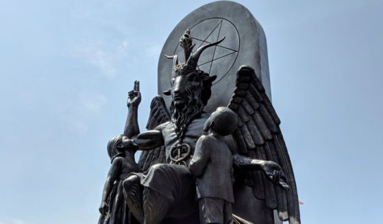 The Satanic Temple unveils its statue of Baphomet at a rally in Little Rock, Arkansas, on Aug. 16, 2018.