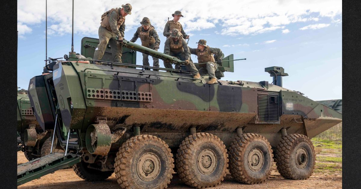 Marines at Camp Pendleton are seen in a Nov. 29 photo on an amphibious combat vehicle similar to the one involved in a fatal accident Tuesday.