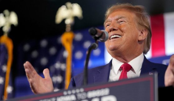 Former President Donald Trump speaks during a Commit to Caucus rally in Ankeny, Iowa, on Saturday. A former White House chief of staff has said that Trump may attend Wednesday's final Republican primary debate.