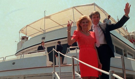 Donald Trump waves to reporters with his wife, Ivana, in 1988