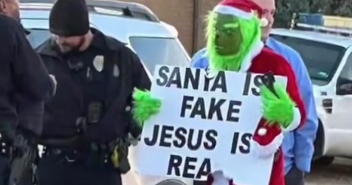 Street preacher David Harold Grisham dressed as the Grinch and stood outside Sleepy Hollow Elementary School in Amarillo, Texas, in late November, holding a sign that read, "Santa is fake Jesus is real" and sparking outrage in parents and administrators.