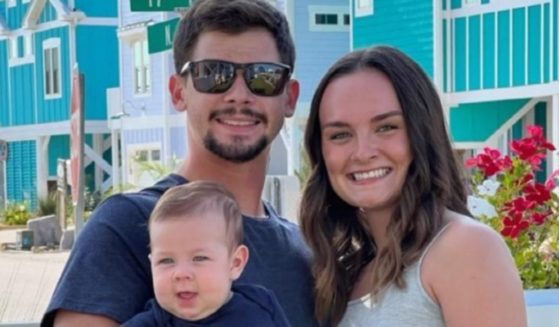 On Dec. 9, Jacob Hahn, left, and Savannah Harding, right, were killed in a car crash, leaving their 9-month-old son Beckett, center, orphaned.