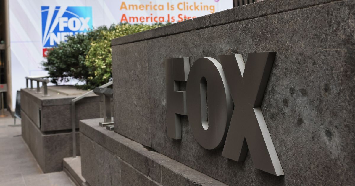 The Fox logo is displayed outside the News Corp Building in New York City.
