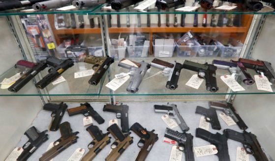 Semi-automatic handguns are displayed at a shop in New Castle, Pennsylvania. A federal judge on Friday struck down the Biden administration’s effort to ban adults between the ages of 18 and 20 from buying handguns.