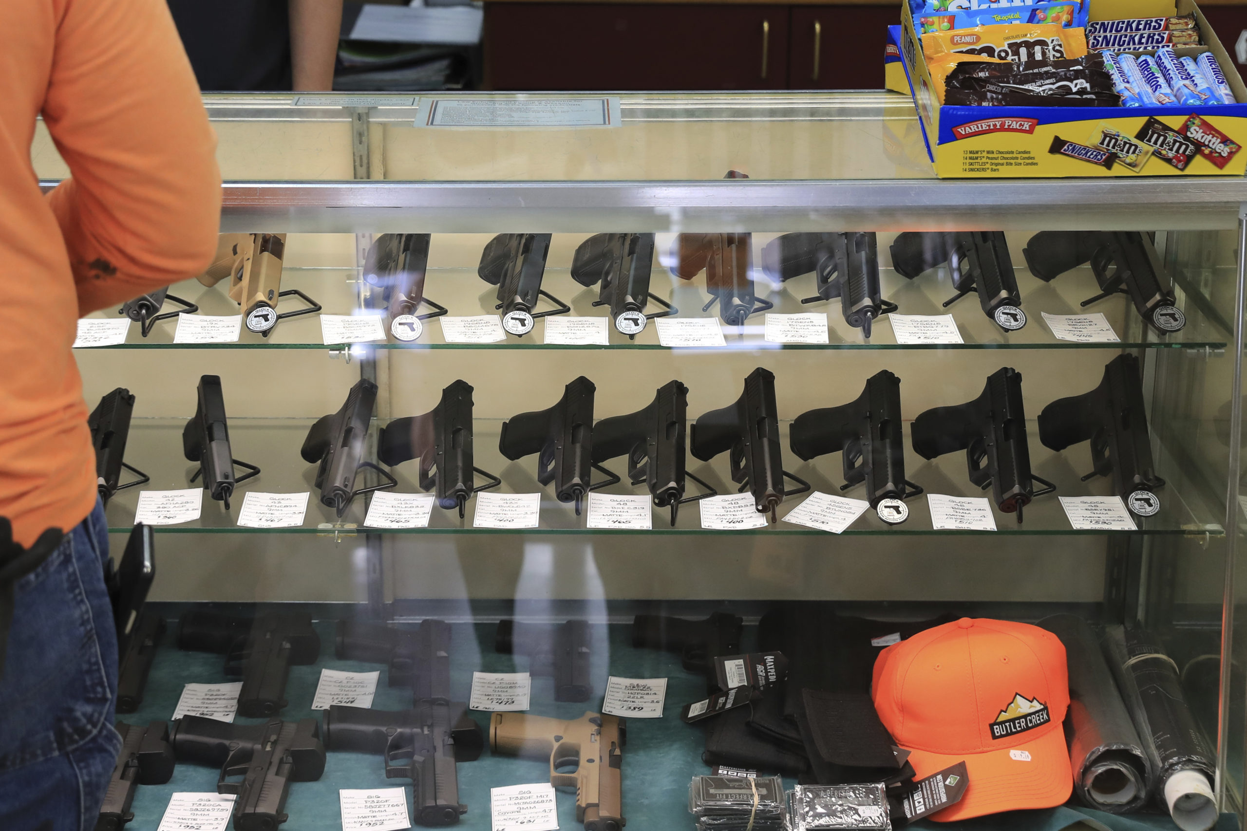 Handguns are displayed at a gun shop in Honolulu. A three-judge panel on Friday blocked major parts of New York state’s anti-gun law while allowing the state to create “sensitive sites” that limit where legal gun owners can carry.