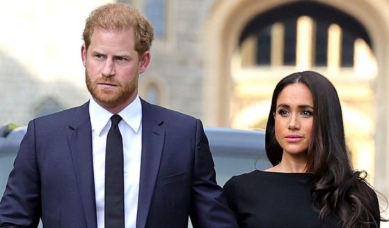 Prince Harry and Meghan arrive to view flowers and tributes to Queen Elizabeth on Sept. 10, 2022.