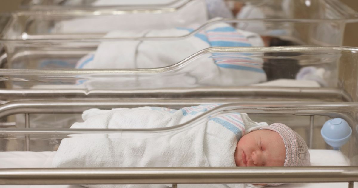 Newborn babies sleep in a hospital nursery. Naming newborns gender-neutral names is becoming the new trend in America, following the progressive LGBT agenda moving through the nation.