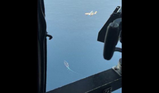 An Iranian drone is seen from a U.S. Navy helicopter.