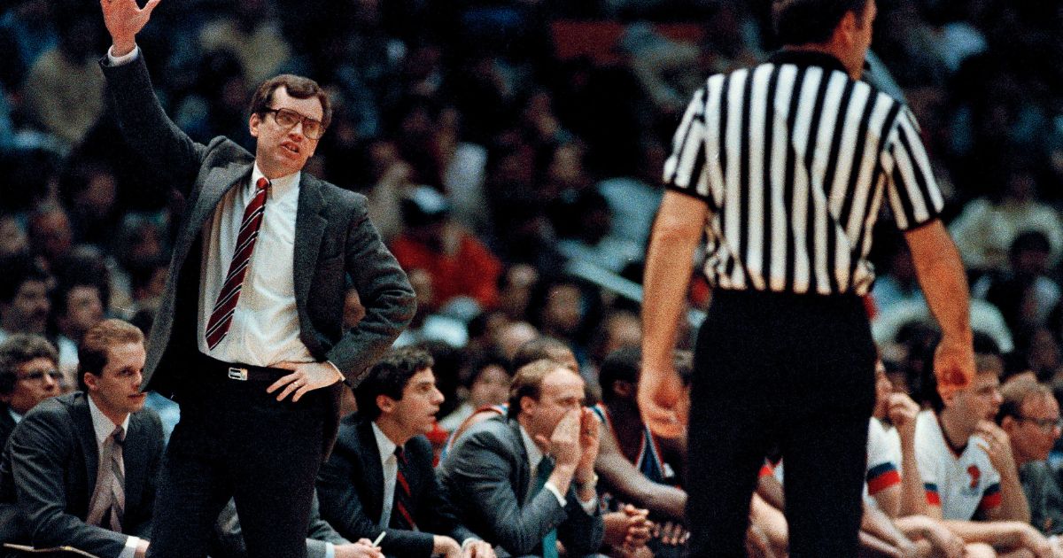 DePaul coach Joey Meyer, left, gestures during an NCAA basketball game between DePaul and Duke at Brendan Byrne Arena in East Rutherford, New Jersey, on March 22, 1986.