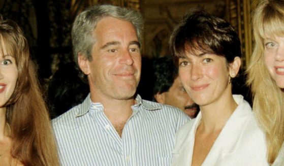 Jeffrey Epstein and Ghislaine Maxwell at a party