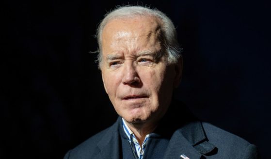 Joe Biden listening to a reporter's question