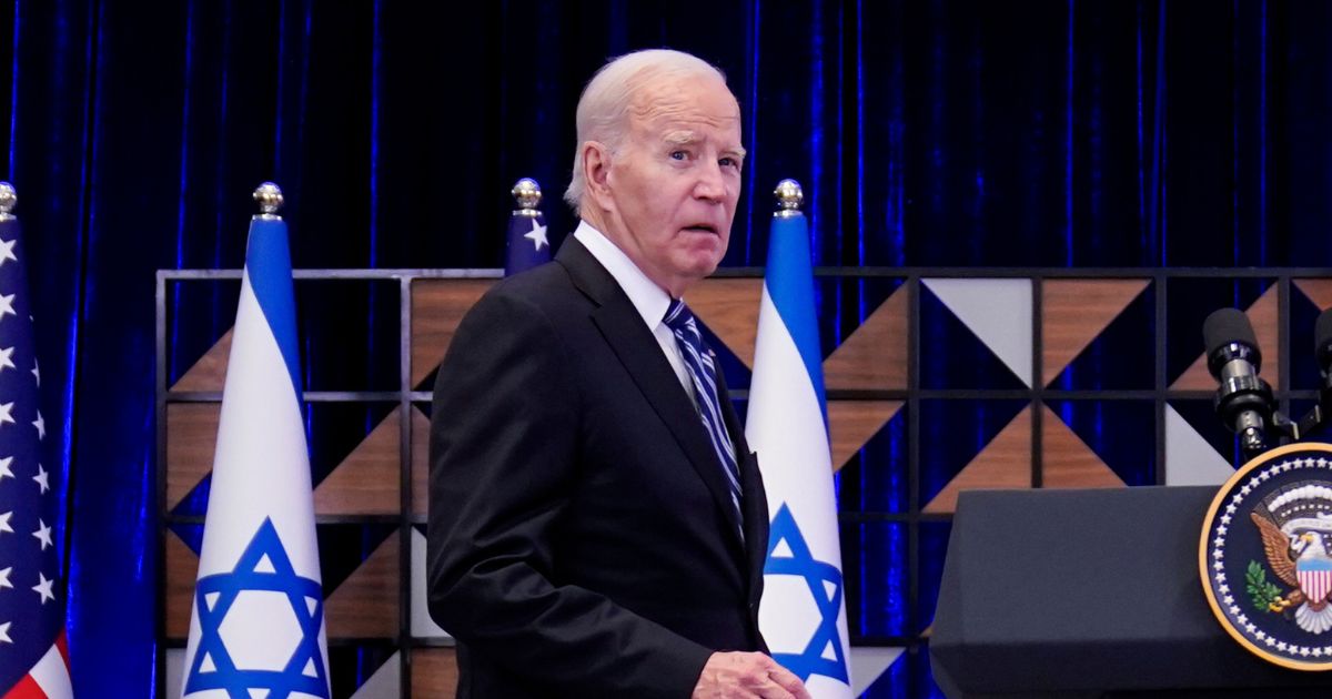 U.S. President Joe Biden stepping up to a podium to make a speech