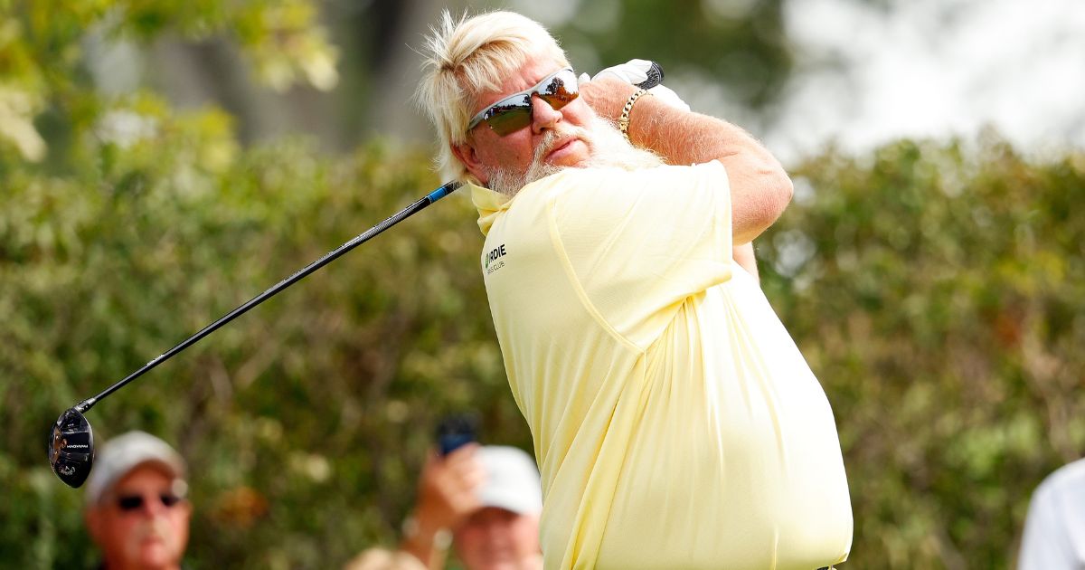 John Daly of the United States plays his tee shot on the third hole during the first round of the Sanford International in Sioux Falls, South Dakota, on Sept. 15. In a recent interview with Tucker Carlson, Daly admitted he has a major habit - drinking Diet Coke.