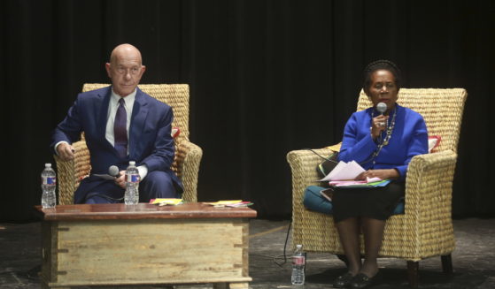 Houston mayoral candidates state Sen. John Whitmire and U.S. Rep. Sheila Jackson Lee speak at a mayoral forum Sunday in Houston.