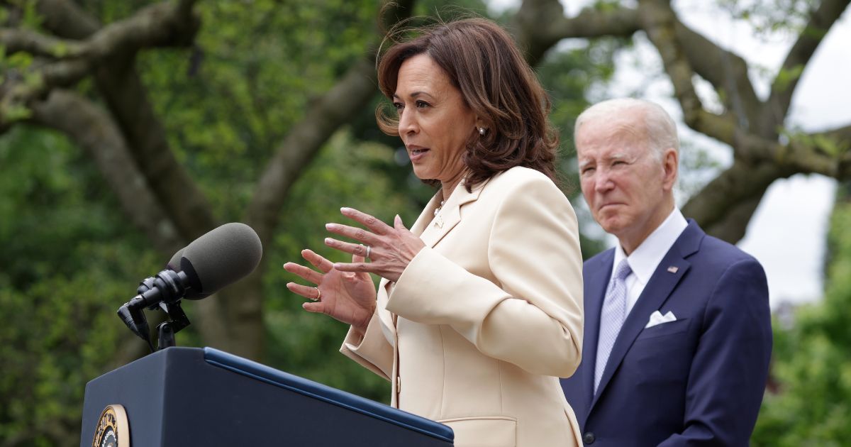 Vice President Kamala Harris speaks as President Joe Biden listens during an event at the White House on May 1 in Washington, D.C.