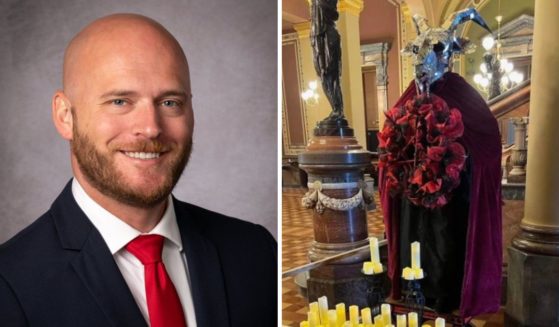 Michael Cassidy vandalized a display put up in the Iowa state Capitol by the Satanic Temple on Thursday.