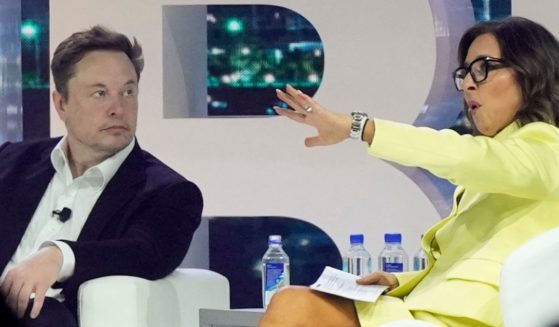 Linda Yaccarino, right, CEO of social media platform X, backed up Elon Musk's controversial statements this week about advertisers he said were attempting to "blackmail" him by pulling their ads.