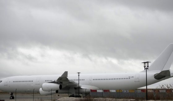 The plane reported to carry some 300 Indian citizens parks at the Vatry airport Saturday in eastern France. About 300 Indian citizens heading to Central America were sequestered in a French airport for a third day Saturday because of an investigation into suspected human trafficking.