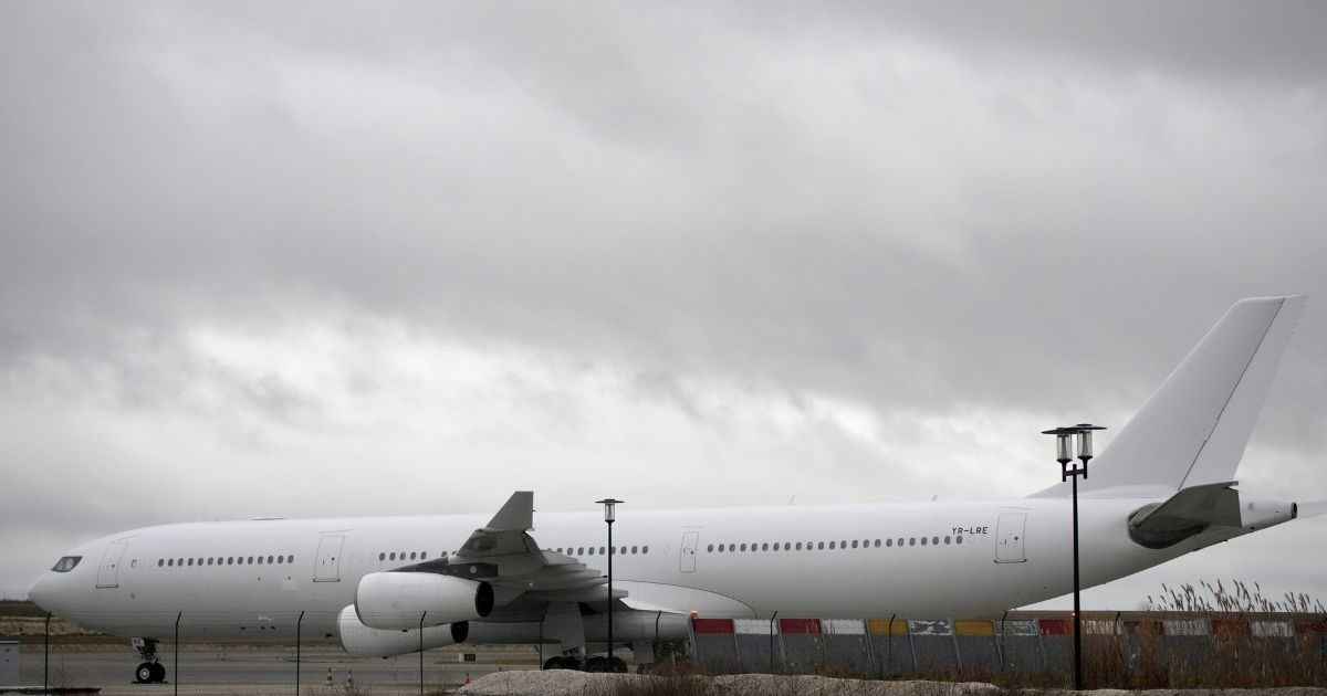 The plane reported to carry some 300 Indian citizens parks at the Vatry airport Saturday in eastern France. About 300 Indian citizens heading to Central America were sequestered in a French airport for a third day Saturday because of an investigation into suspected human trafficking.