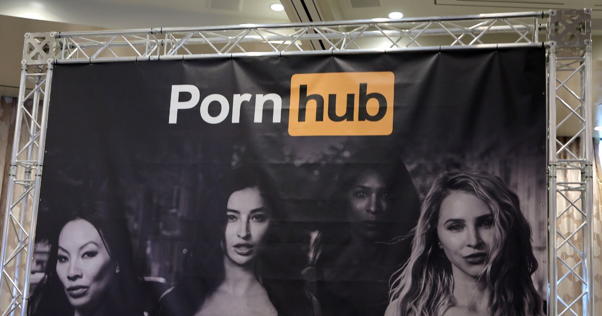 a sign at the Pornhub booth at a convention in Las Vegas