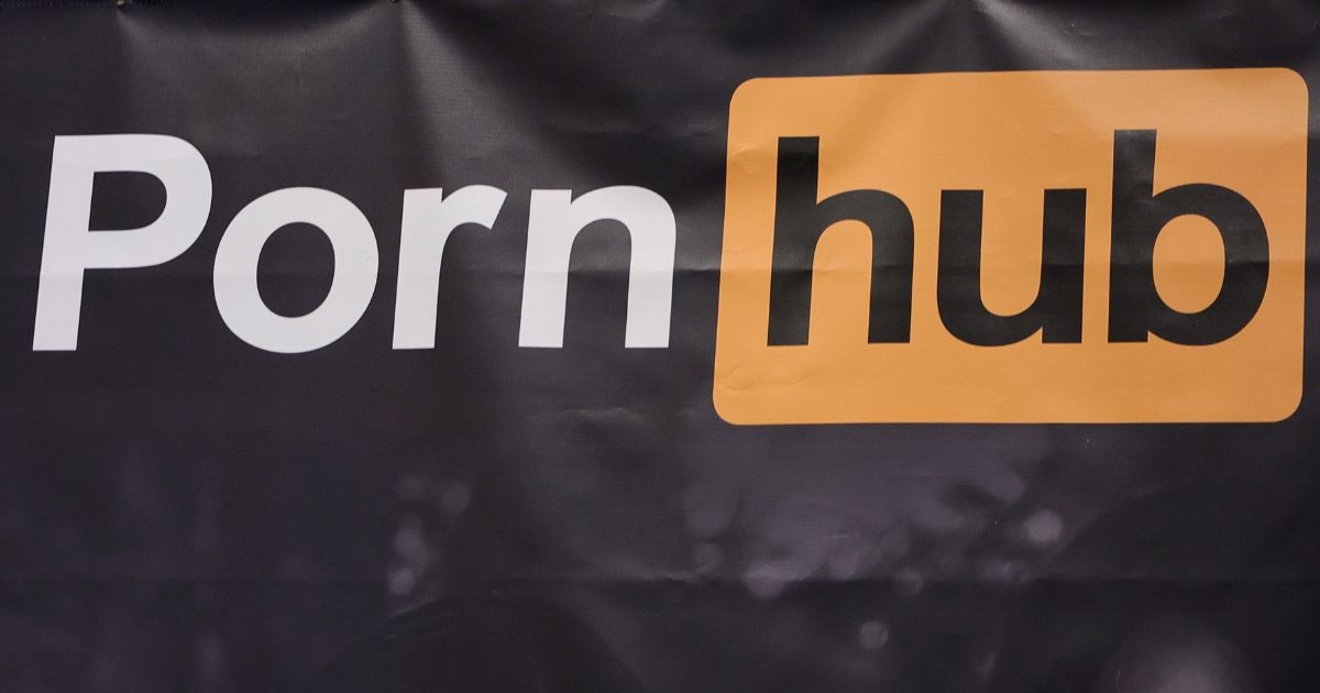 The Pornhub logo is displayed on a banner at the Pornhub booth at the 2023 AVN Adult Entertainment Expo in Las Vegas, Nevada, on Jan. 6.