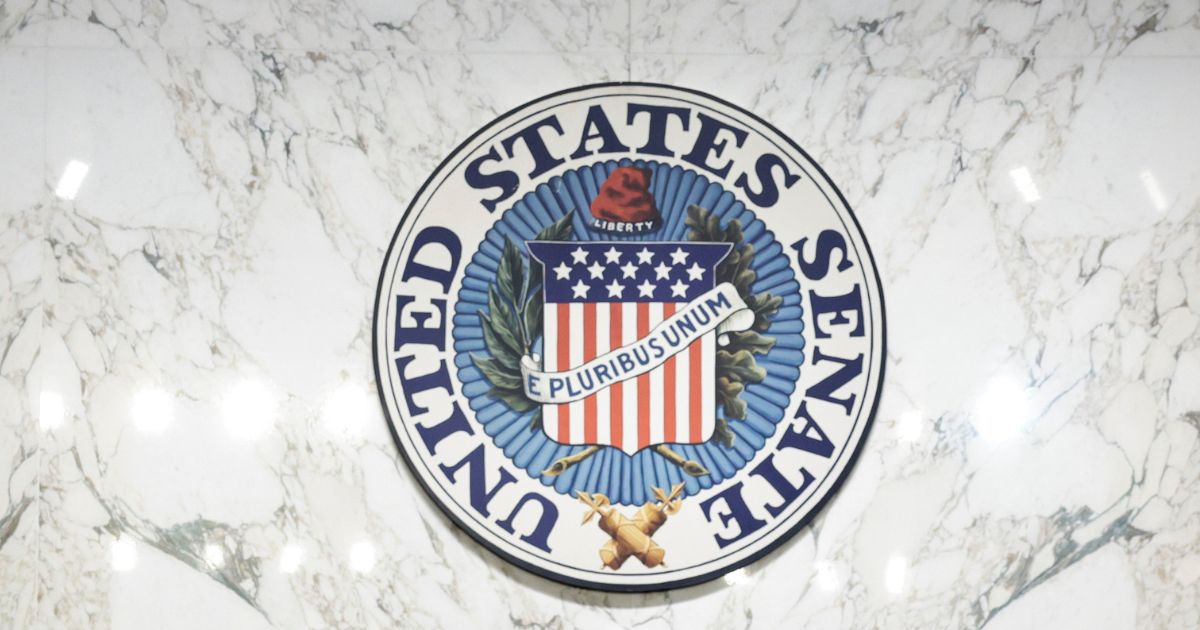 The U.S. Senate logo is seen on the wall of the Judiciary Room in the Hart Senate Office Building on Capitol Hill in Washington, D.C.