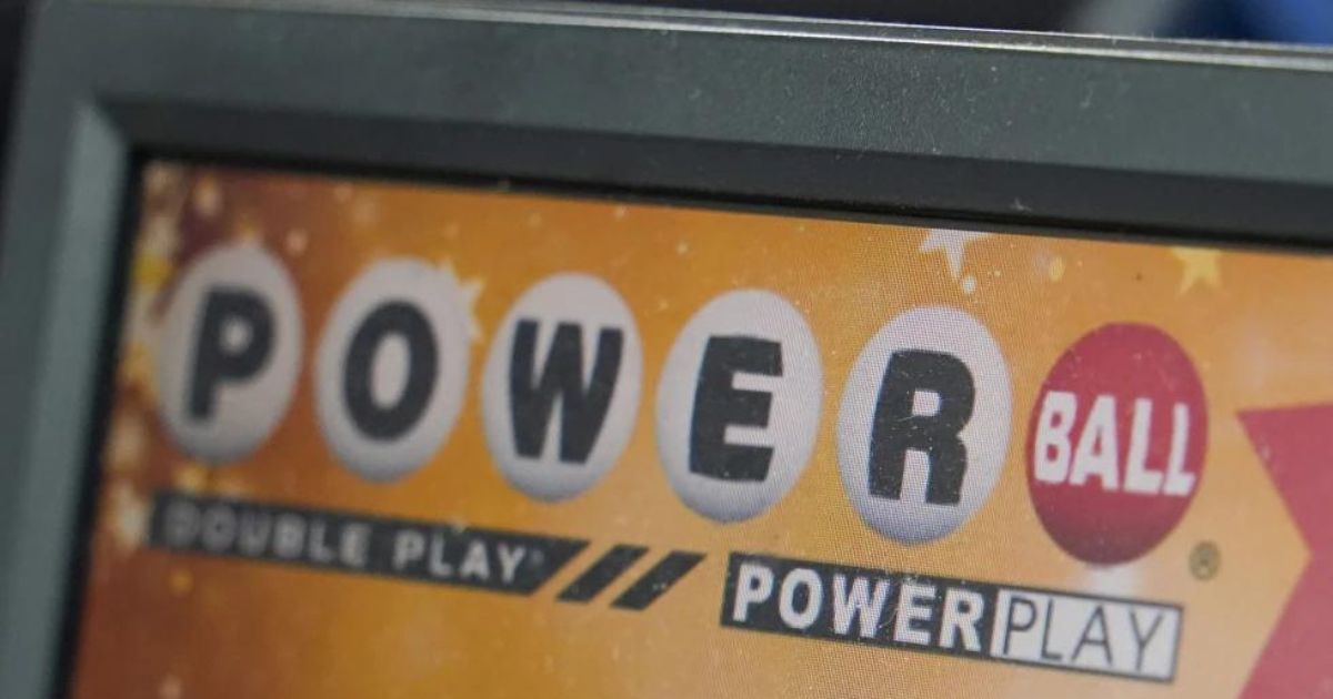 A display panel advertises tickets for a Powerball drawing at a convenience store on Nov. 7, 2022, in Renfrew, Pennsylvania. This week, Powerball losers in Iowa actually were winners for about seven hours.