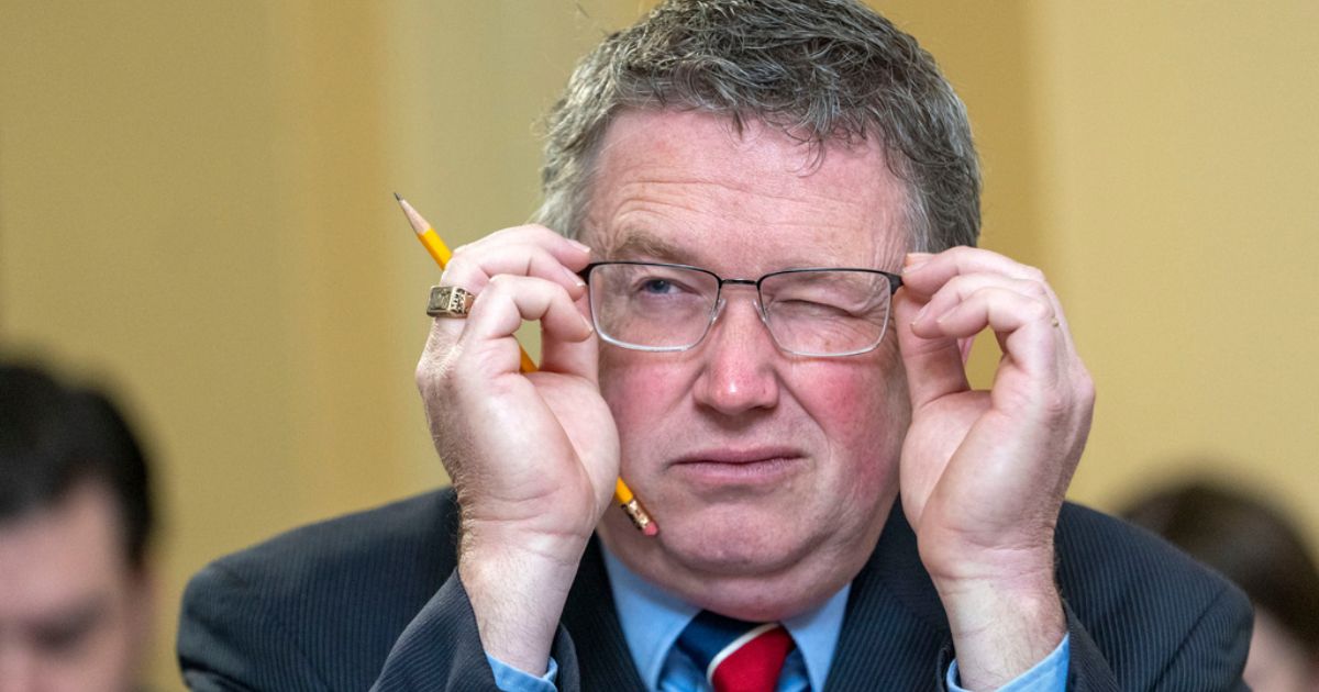 Rep. Thomas Massie, R-Ky., adjusts his glasses while attending a House Rules Committee markup hearing, part of the existing House of Representatives inquiry into whether sufficient grounds exist to impeach President Joe Biden, Friday, in Washington.