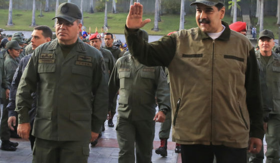 Venezuela's President Nicolas Maduro, right, accompanied by his Defense Minister Vladimir Padrino, in Caracas, Venezuela.