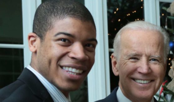 Will Pierce, left, poses with then-candidate Joe Biden in March 2020. In a recent op-ed, Pierce outlined why he no longer supports Biden and has moved away from the Democratic Party to join the Republicans.