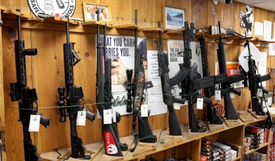 "Assault-style" rifles are displayed at Freddie Bear Sports on Jan. 11, 2023, in Tinley Park, Illinois. Workers began removing banned items from display that morning after Illinois Gov. J.B. Pritzker signed legislation the night before, banning the sale of guns classified as assault weapons, rifle magazines capable of holding more than 10 rounds and pistol magazines capable of holding more than 15 rounds in the state. The law is due to go into effect Jan. 1 after the Supreme Court declined to block the ban while it is appealed.