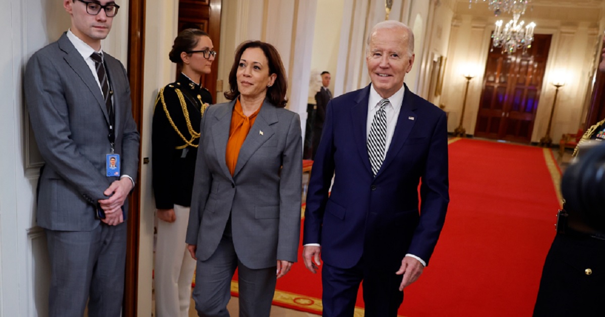 President Joe Biden and Vice President Kamala Harris, pictured walking a White House hallway in an Oct. 30 file photo.