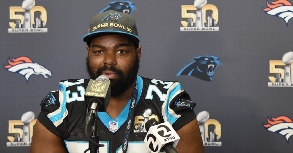 Then-Carolina Panthers tackle Michael Oher addresses the media prior to Super Bowl 50 in San Jose, California.