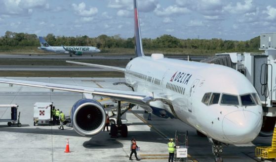 A Delta Airlines plane sits at the gate at Cancun International Airport (CUN) on May 26, 2023.