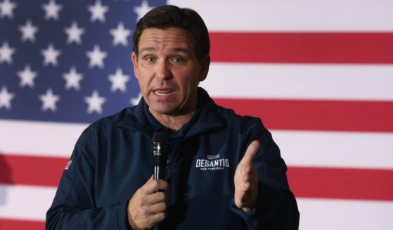 Republican presidential candidate Florida Governor Ron DeSantis speaks to guests during a campaign rally at the Thunderdome on Saturday in Newton, Iowa.