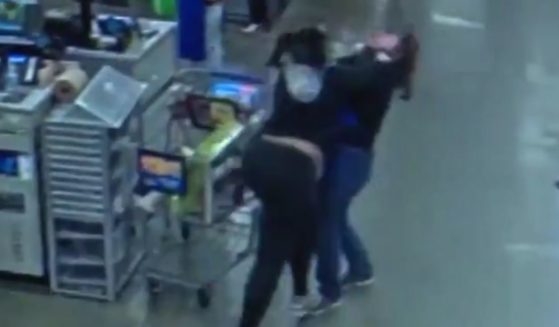 This Twitter screen shot shows the confrontation between a Michigan mother and a store clerk.
