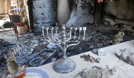 A Hanukkah menorah is left on a counter of a destroyed house after Hamas attacked this kibbutz on Oct. 7 near the border of Gaza on Nov. 1, in Kissufim, Israel.