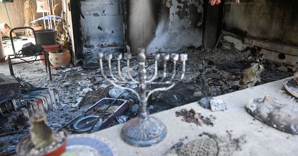A Hanukkah menorah is left on a counter of a destroyed house after Hamas attacked this kibbutz on Oct. 7 near the border of Gaza on Nov. 1, in Kissufim, Israel.