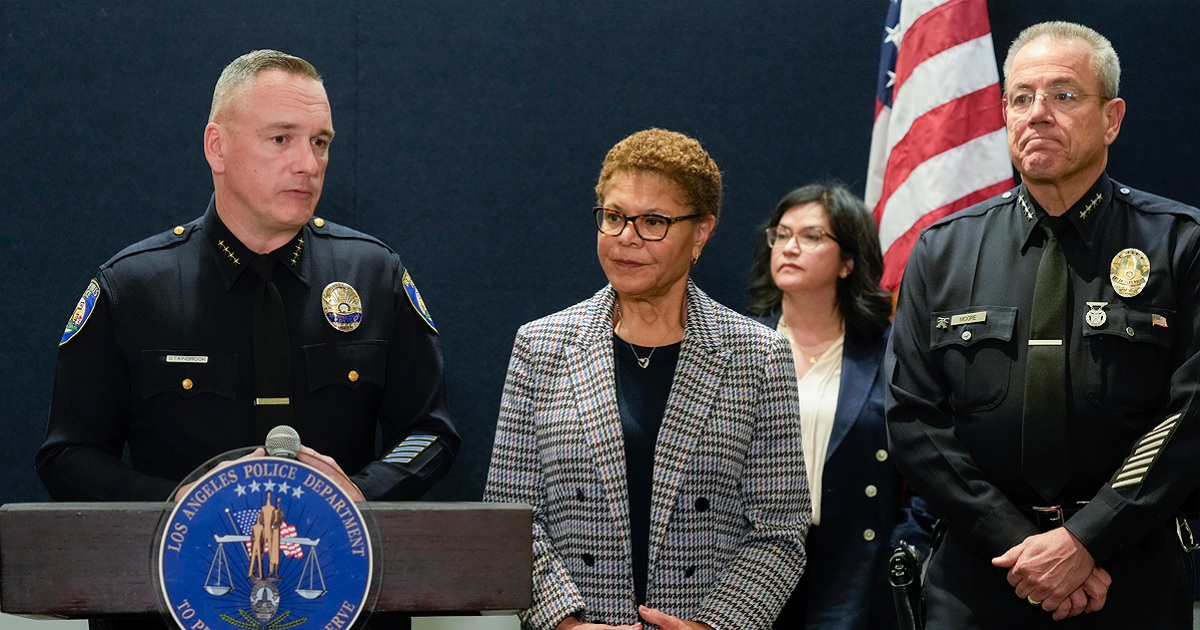 Beverly Hills Police Chief Mark Stainbrook, left, Los Angeles Mayor Karen Bass and Los Angeles Police Chief Michel Moore announce the arrest Saturday of a suspect in three recent killings of homeless men in Los Angeles.