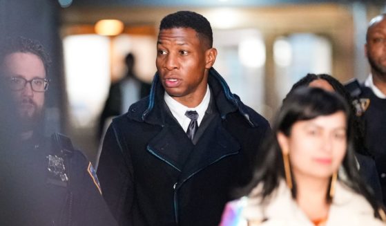 Actor Jonathan Majors leaves the courthouse following closing arguments in Majors' domestic violence trial at Manhattan Criminal Court on Friday in New York City.